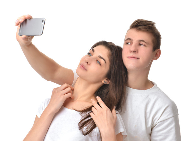 Young happy couple taking Selfie pictures on mobile cell phone - Zdjęcie, obraz
