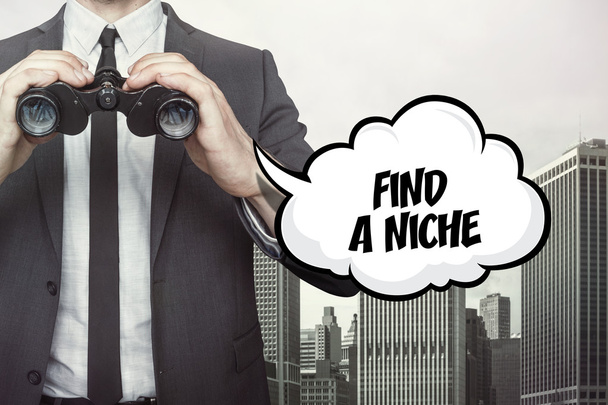Find a niche text on speech bubble with businessman holding binoculars - Foto, imagen