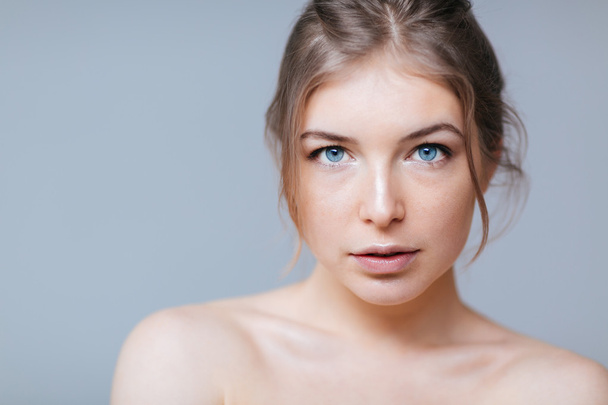 Charming woman with blue eyes - Valokuva, kuva