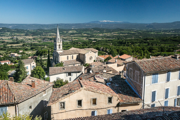 Luberon landscape view with cathedral - Foto, afbeelding