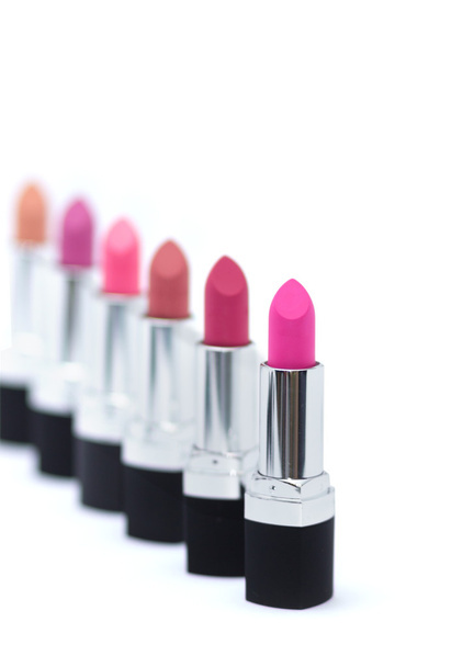 close up of various lipsticks on white background - Foto, afbeelding