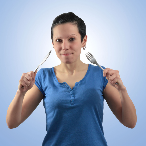 Девушка с ножом и вилкой
  - Фото, изображение