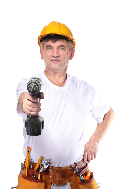Builder with belt construction and holding drill isolated on white - Foto, Bild