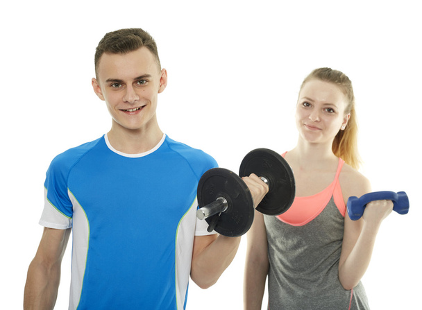 boy and girl doing a fitness workout - Foto, afbeelding
