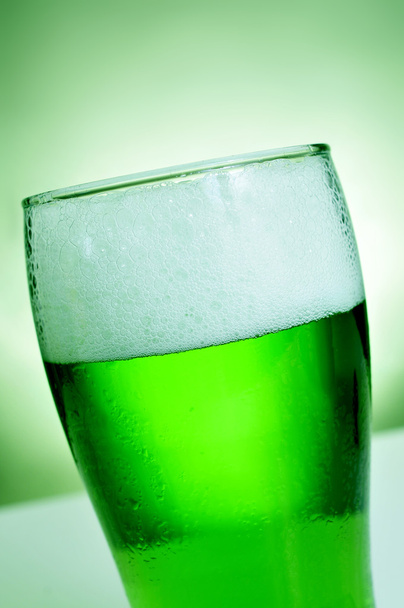 glass with dyed green beer - Photo, image