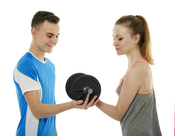 erkek ve kız bir fitness egzersiz yapıyor - Fotoğraf, Görsel