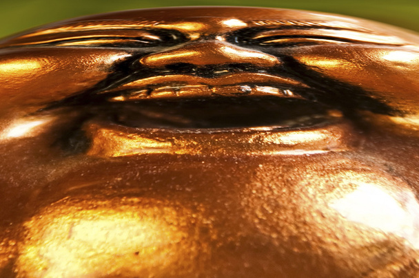 Buddha smiles, bent face - Photo, Image