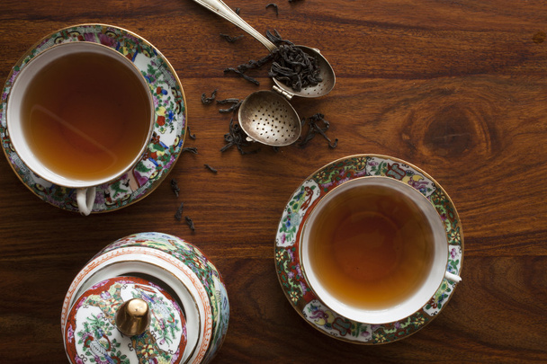 filiżanka herbaty na drewnianym stole - Zdjęcie, obraz