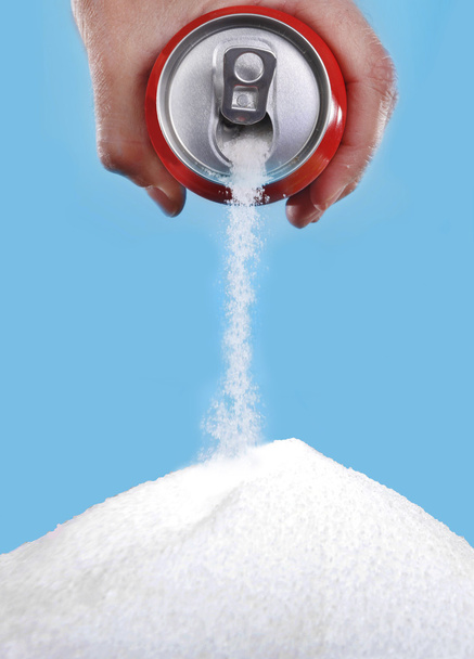 hand holding soda can pouring a crazy amount of sugar in metaphor of sugar content - Photo, Image