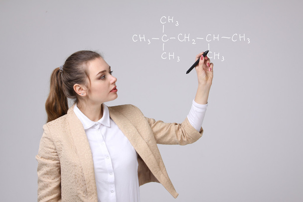 Woman chemist shows a molecular structure - Fotoğraf, Görsel