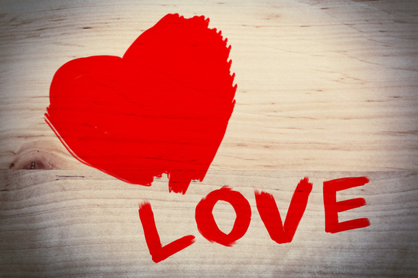 Word "Love" painted on wall background - Fotó, kép