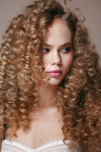 high angle portrait of the pretty young woman with beauty curly hairs - Foto, Imagem