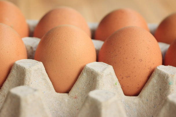 fresh yolk egg box - Foto, afbeelding