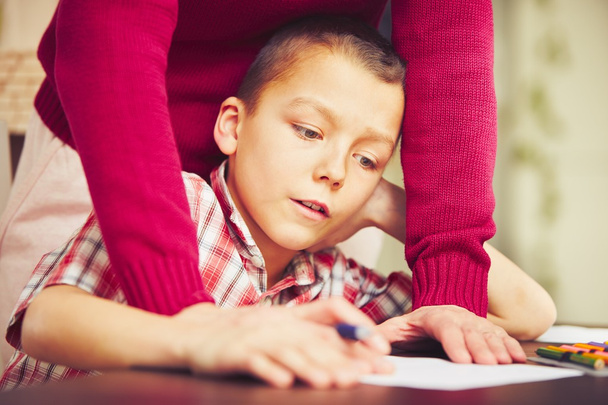 Boy is doing homework  - Fotografie, Obrázek