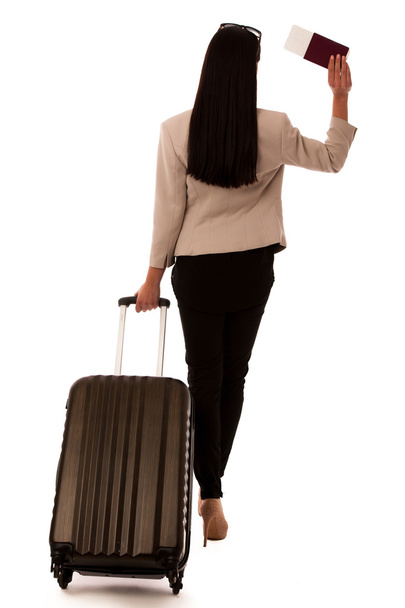 Woman with suitcase and travel documents going on a business tri - Foto, immagini