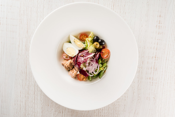 salad with tuna on plate - Фото, изображение