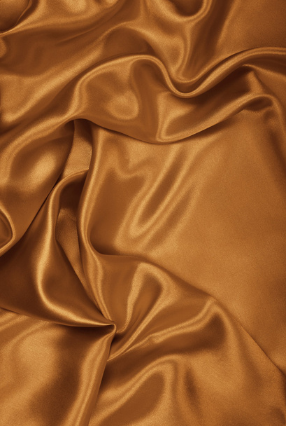 Smooth elegant golden silk or satin as wedding background. In Se - 写真・画像