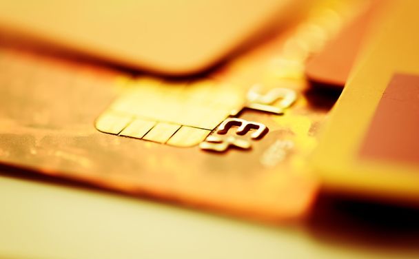 Tarjetas de crédito en color dorado
 - Foto, imagen