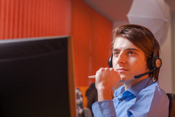 Call center agent at work in box office - Photo, Image