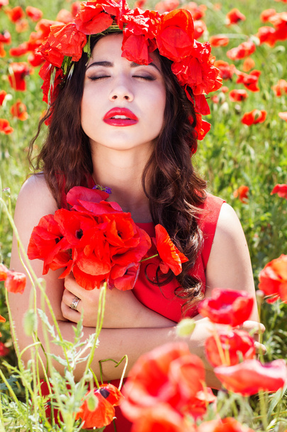 Beauty woman with wreath of poppies flowers - Zdjęcie, obraz