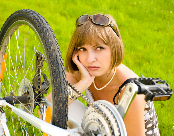 woman sitting on bike  - Photo, Image
