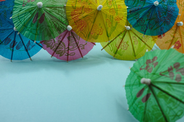 Colorful paper umbrellas, copy space, party concept - Fotó, kép