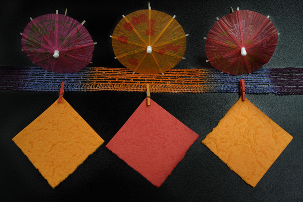 Party concept - colorful paper umbrellas and notes, copy space - Fotoğraf, Görsel