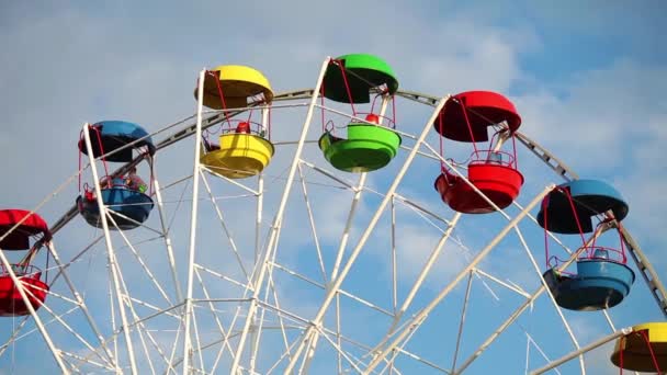 Colorful cabins of ferris wheel close up - Footage, Video