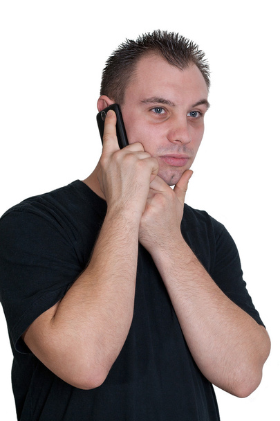 Young man talking to someone with his cellphone - Foto, imagen