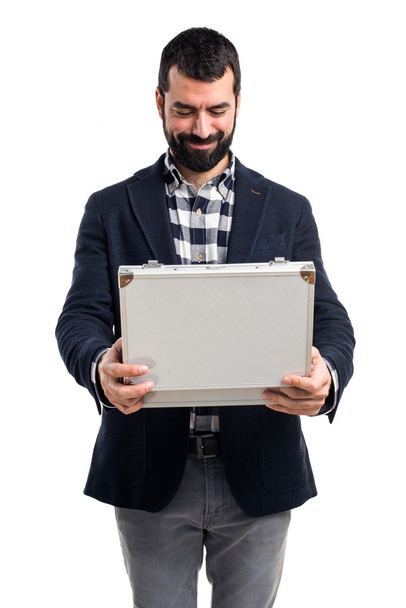 Man holding a briefcase - Photo, image