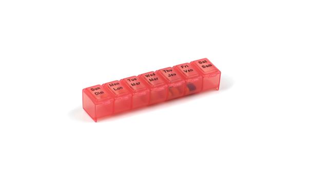 Rode kunststof pil container. - Foto, afbeelding