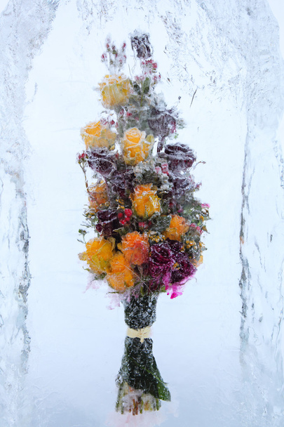 Frozen beautiful flowers with yellow roses - 写真・画像