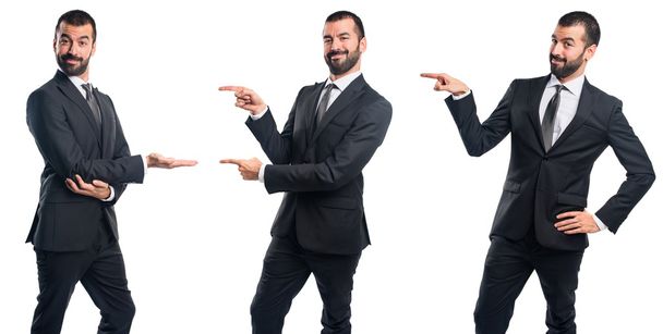 Businessman pointing to the lateral - Photo, Image