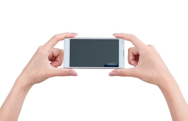 Hands holding smart phone - Фото, зображення