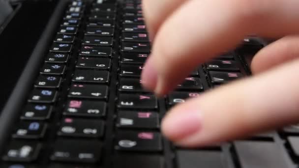 Both hands of an office worker typing on black keyboard, close up - Footage, Video