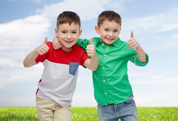 happy smiling little boys showing thumbs up - Foto, Imagem