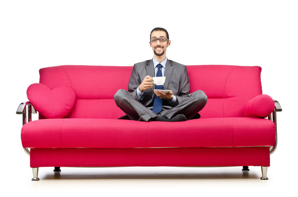 Man sitting in the sofa - Foto, Imagen