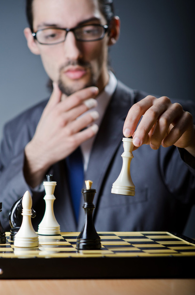 Chess player playing his game - Foto, Bild