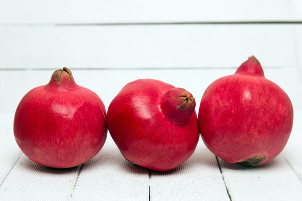 Fresh pomegranate fruits on white - Photo, Image