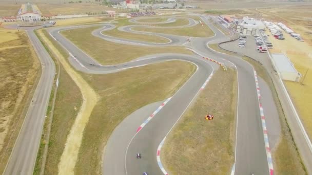 空中からの眺め。ロシアのカーティング選手権中のレーシングカート - 映像、動画