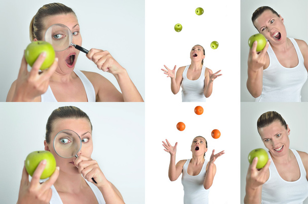 Mulher feliz loira saudável joga e olha laranjas de maçãs
 - Foto, Imagem