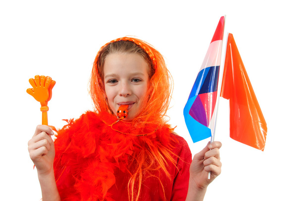 Girl is posing in orange outfit for soccer game - Foto, imagen