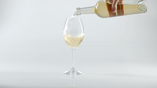 White wine poured into glass, white - Footage, Video