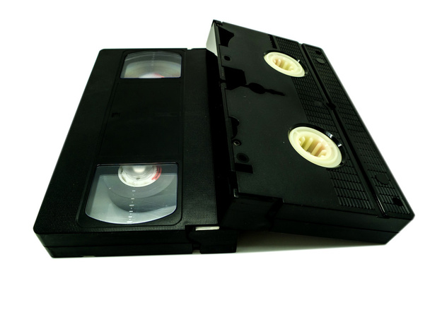 白い背景の上の 2 つのビデオテープ - 写真・画像