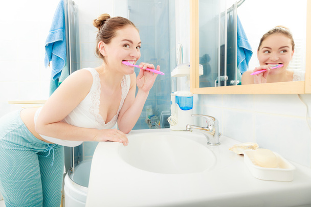Woman brushing cleaning teeth. Oral hygiene. - Photo, Image