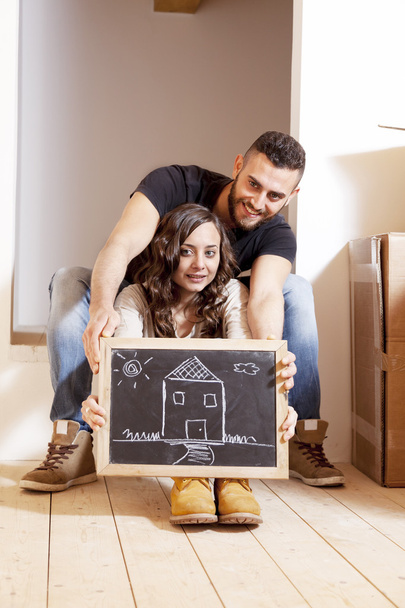 young couple moves into new home - Photo, Image