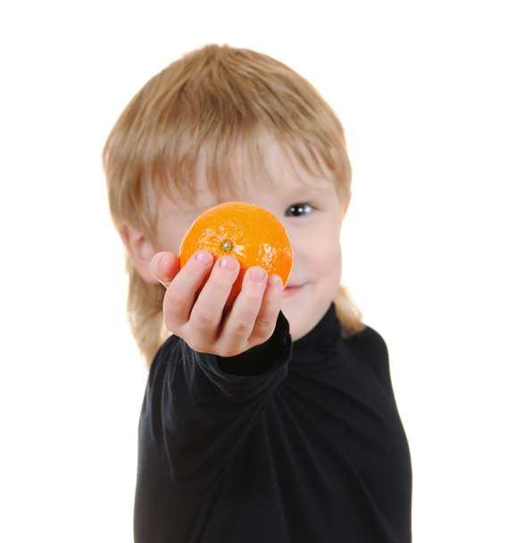 cute little boy with orange isolated  - Foto, immagini