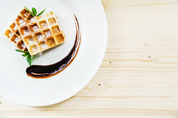 waffle with chocolate on plate - Φωτογραφία, εικόνα