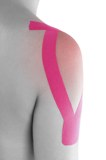 Kinesio tape on female shoulder - Foto, imagen