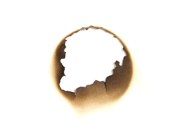 Buraco de papel queimado
 - Foto, Imagem